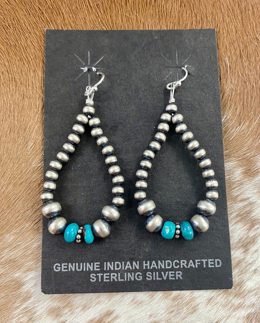 Beautiful hook lightweight teardrop earrings made of sterling silver Navajo Pearls and turquoise. The ideal earrings for the upcoming summer weather! The perfect earrings to add to your jewelry collection or give as a present to someone you care about. These hand-strung teardrop earrings are made of Navajo pearls. To provide sturdiness and peace of mind, each silver component is soldered shut.