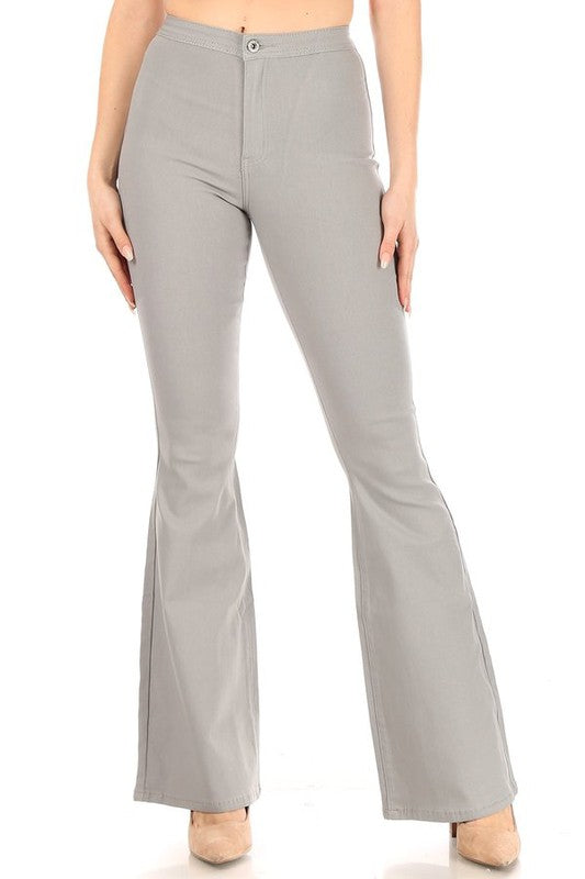 High waisted really soft stretchable denim flare jeans. These are so soft and will fit your body like no other jeans. The high waist fit sucks you in and gives you a very flattering fit. High waisted form fitting, butt lifting, super stretch material. Model is wearing a size Small.
