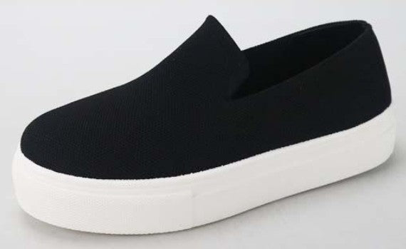 True to size very comfortable slip on black sneakers with platform heel. The perfect pair of shoes to wear anywhere. Pair with a skirt or dress for a more elevated look or pair with some jeans for a more relaxed comfortable style outfit. Comfortable Slip On Black Platform Sneaker Shoes