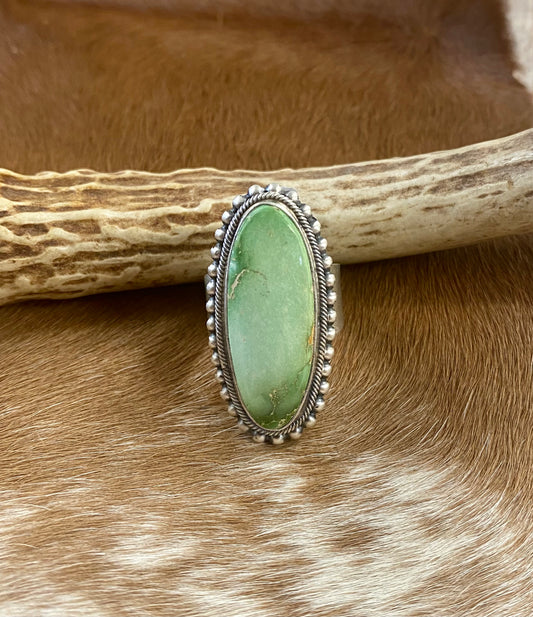 Sterling silver Emerald Valley Turquoise handmade single stone unique statement size 8 3/4 ring.  The perfect piece to add to anyone's jewelry collection! This beautiful ring is stamped sterling and signed by Native American artist Paul Livingstone on the back.    Size: Length 1 1/2” x  3/4” inch width   Ring Size: 8 3/4  Signed: YES "Paul Livingstone"  Artist/ Hallmark: Paul Livingstone  Stone: Emerald Valley Turquoise