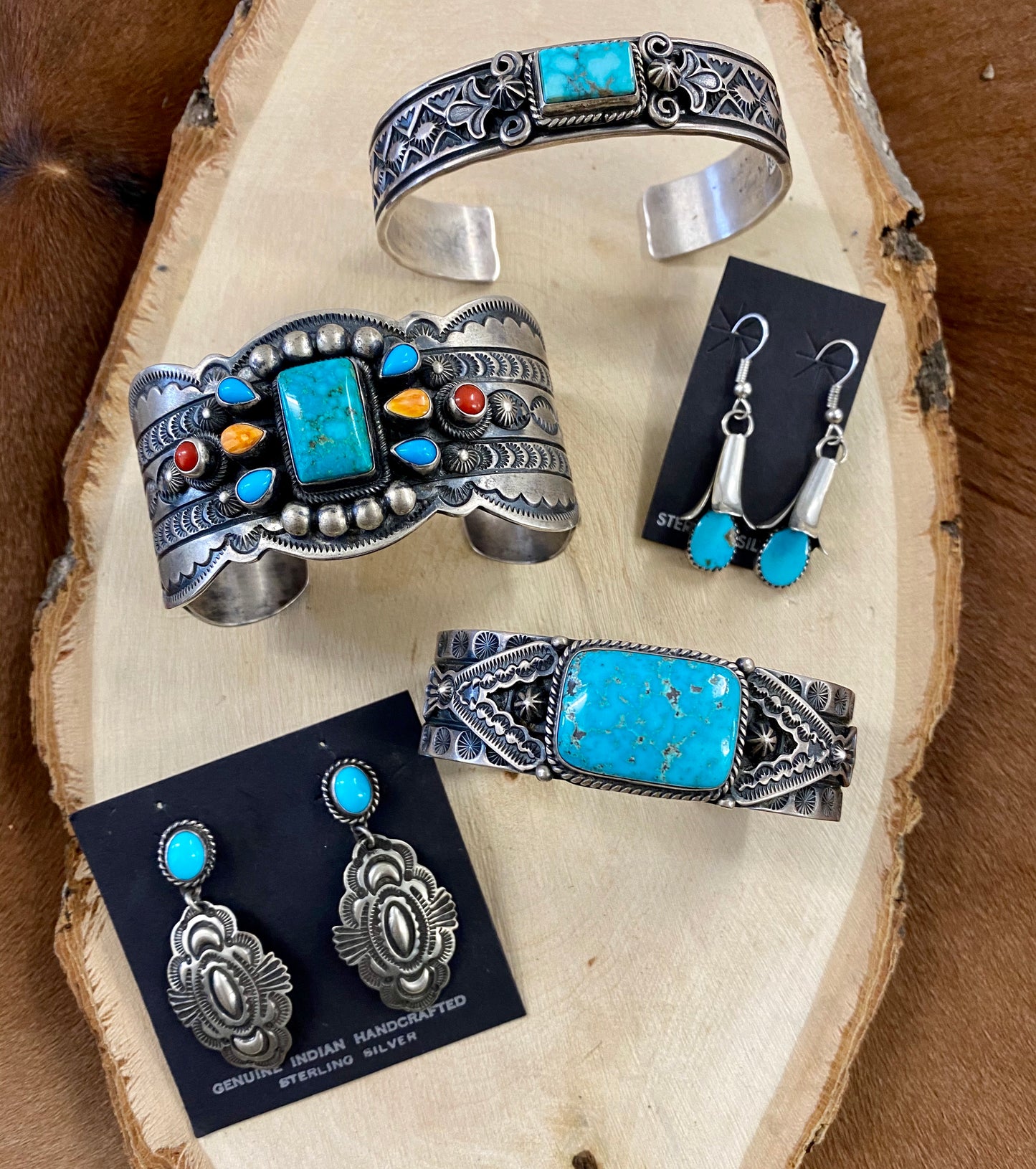 The D. Cadman Turquoise Earrings - Ny Texas Style Boutique Turquoise post sterling silver dangle statement earrings, signed and made by Native American artist silversmith Darrell Cadman. These beauties are Native made stamped sterling and signed "D. Cadman" on the back. Size: 1.75” Inches length Stone: Turquoise Signed: YES "D. Cadman" Artist/Hallmark: Darrell Cadman