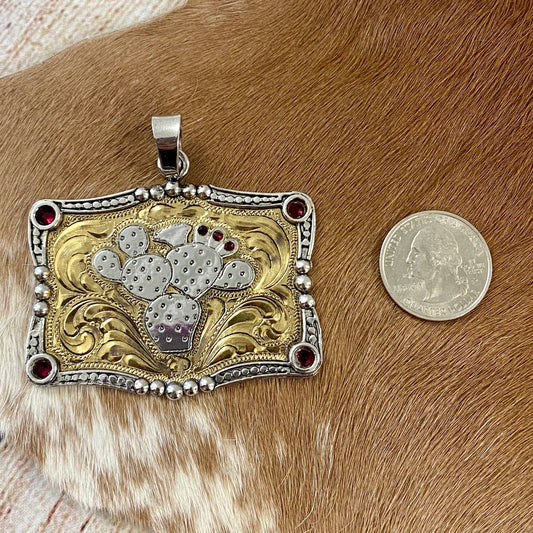 The Large Cactus Pendant - Ny Texas Style Boutique Large Engraved Western Silver Plate Cactus Pendant With Red Stones Handmade large rectangle shape cactus pendant featuring silver plate with gold plate engraving on front. Includes 7 red stones. 2 ½ inches by 1 7/8 inches. The perfect western cactus pendant to add to a chain or Navajo pearl necklace. Cactus Western Silver Pendant, Cactus Pendant Gold, Unique Western Jewelry Pendants