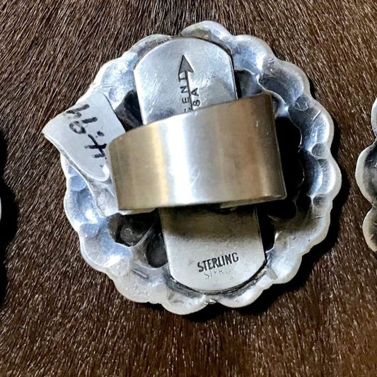 Adjustable Concho Ring Signed By Native Artist Vincent J. Platero Native American made sterling silver Concho style stamped ring. Size: Round Circle : 1.5” inch wide round   Signed: YES "VJP"  Hallmark/Artist: Vincent J. Platero stamped sterling and signed by their artist silversmith Vincent J. Platero. Handmade western concho style adjustable ring by Native American artist silversmith. Western statement ring.