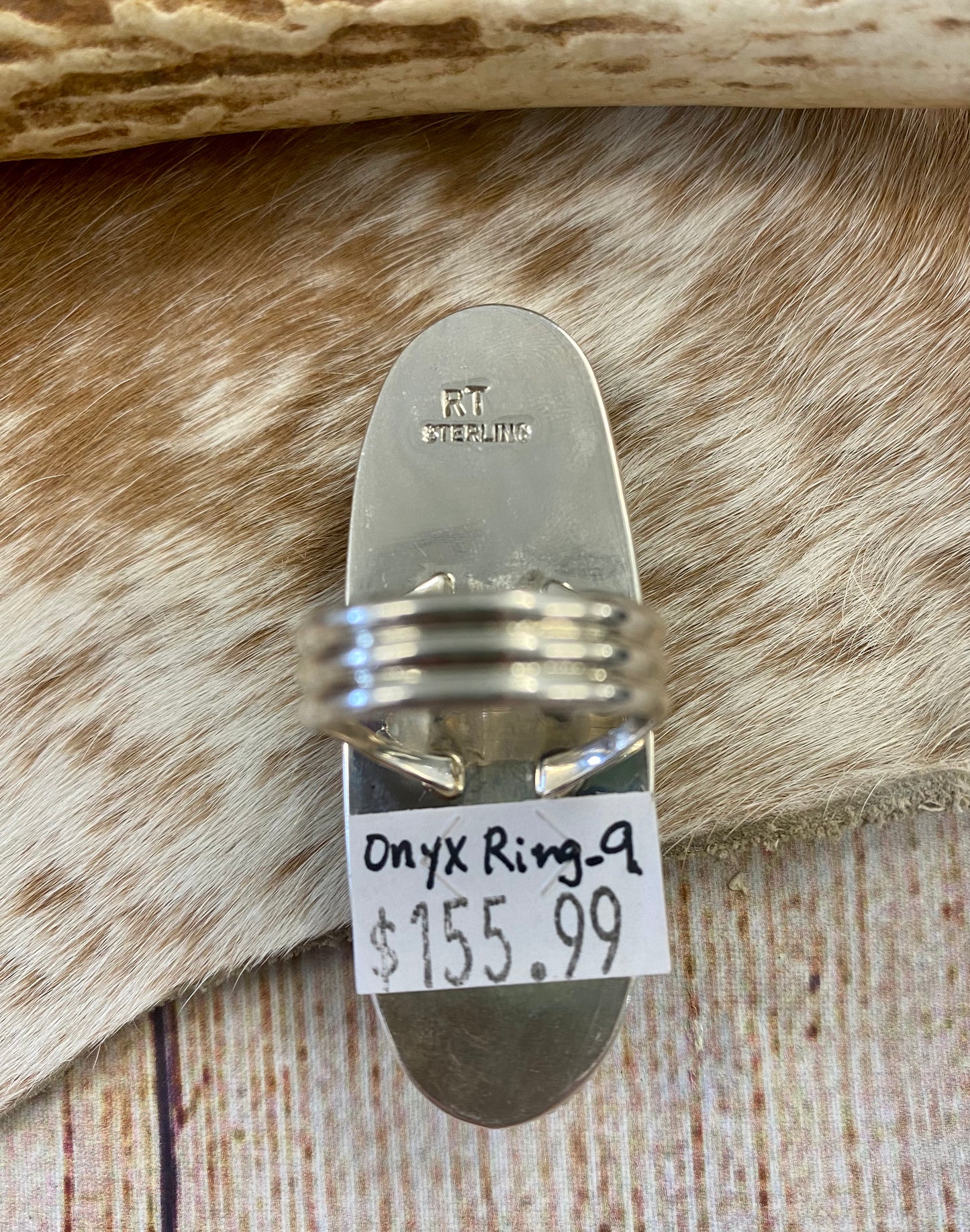 Large sterling silver onyx single stone handmade statement size 9 ring. Stamped sterling and signed RT artist silversmith on the back of the ring. The perfect unique piece of jewelry to add to your next outfit! Size: 2” inches length x 3/4” inch width Ring Size: 9 Signed: YES "RT " Stone: Onyx