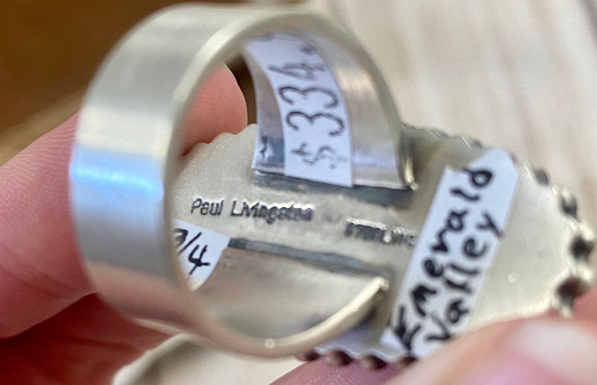 Sterling silver Emerald Valley Turquoise handmade single stone unique statement size 8 3/4 ring.  The perfect piece to add to anyone's jewelry collection! This beautiful ring is stamped sterling and signed by Native American artist Paul Livingstone on the back.    Size: Length 1 1/2” x  3/4” inch width   Ring Size: 8 3/4  Signed: YES "Paul Livingstone"  Artist/ Hallmark: Paul Livingstone  Stone: Emerald Valley Turquoise