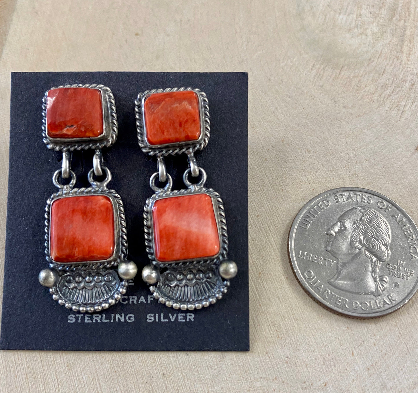 The O.A. Spiny Oyster Earrings - Ny Texas Style Boutique Red orange Spiny Oyster post sterling silver earrings. Stamped sterling and signed by Native American artist silversmith Oscar Alexius on the back. The perfect pop of color for any outfit! Size: 1.25” Inches Length Stone: Spiny Oyster Singed: YES "O.A." Hallmark/Artist: Oscar Alexius