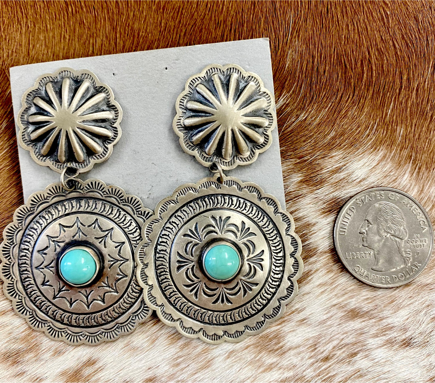 The Harris Joe Concho Turquoise Earrings - Ny Texas Style Boutique Sterling silver double Concho beautiful silver stamped earrings with turquoise stones in the center. Post large statement piece earrings that are stamped sterling and signed Harris Joe by Native American artist silversmith Harris Joe. These earrings will make a statement when paired with any outfit.