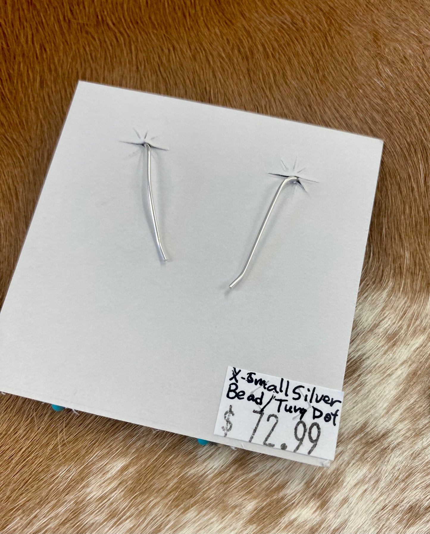 Simple lightweight and gorgeous authentic hand-strung Navajo Pearl sterling silver teardrop earrings with a turquoise stone on the bottom of each earring. Hook-closure earrings are perfect for everyday casual outfits and dressed-up ones.   Size: 1.5" inches length earrings.  Stone: Navajo Pearl & Turquoise