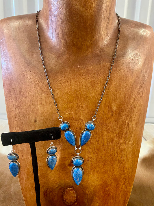Stunning blue lapis lariat style sterling silver Native American made necklace and drop hook matching earrings set. Gorgeous sterling silver lapis hook blue lapis earrings. Perfect jewelry set to gift to your loved one or keep for your own jewelry collection! Both pieces are stamped sterling and signed "G BOYD Navajo". Size: 24” inch necklace + 1” inch earrings Stone: Lapis Signed: YES