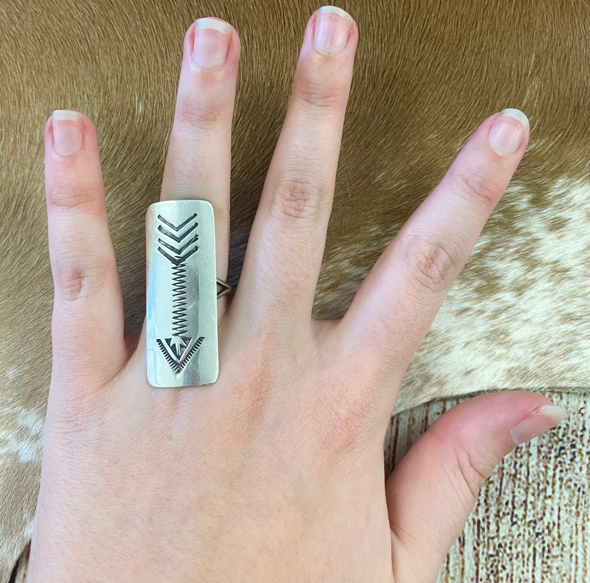 Long beautiful arrow design sterling silver statement ring. Stamped sterling and signed “K” by artist silversmith. Stunning size 8 unique piece. The perfect piece to wear on your index, middle, or ring finger!   Size: 1.75" Inch length   Signed: YES "K"