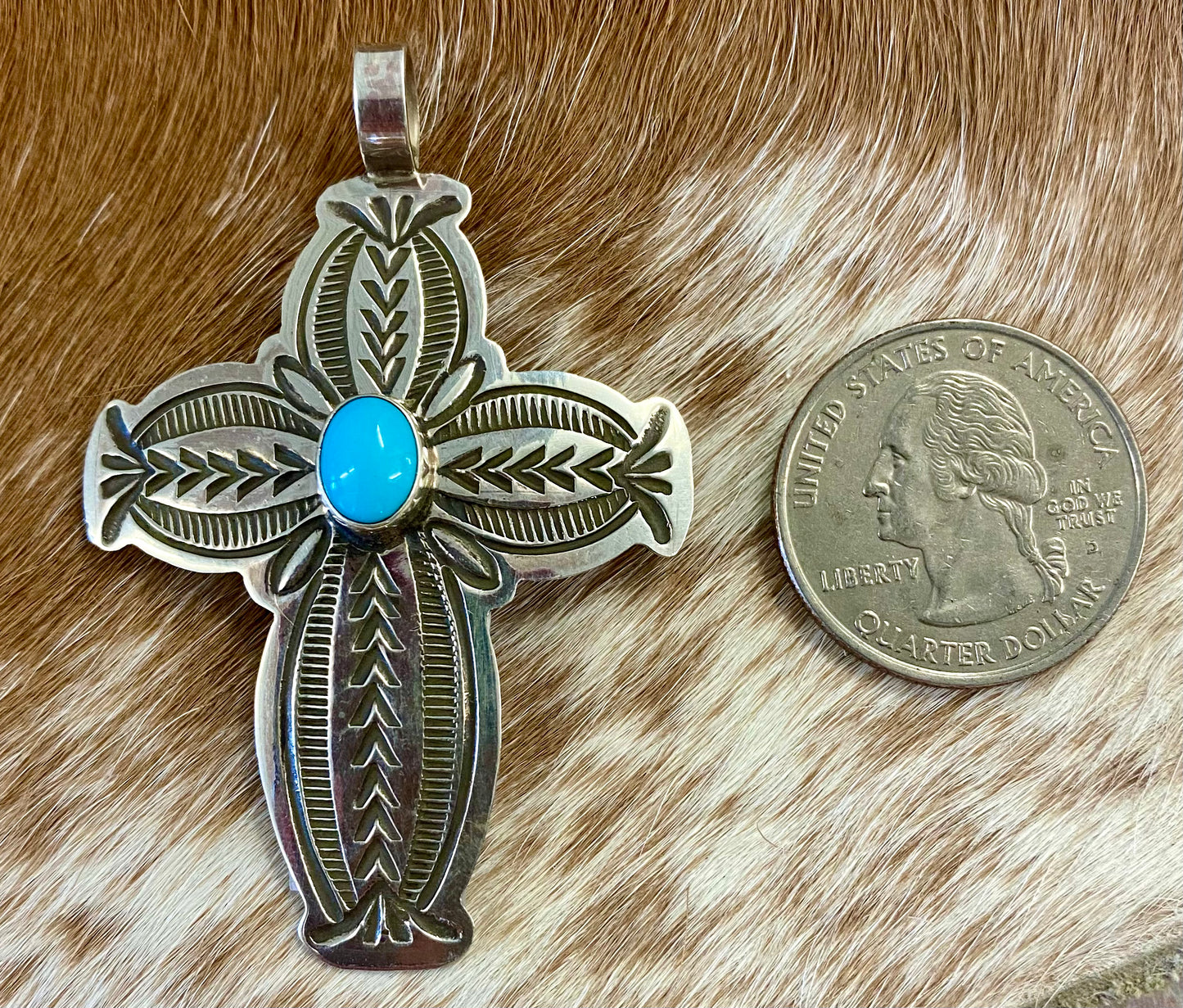 Beautiful sterling silver Native made turquoise cross pendant. Stamped sterling and signed BLKGT by Native American artist silversmith Arnold Blackgoat. The perfect cross to wear on any length chain necklace or a very small 3mm Navajo pearl necklace. Size: 2” inches length x 1.5” inches width Signed: YES "BLKGT" Hallmark/Artist: Arnold Blackgoat Stone: Turquoise