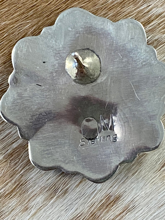 Beautiful sterling silver simple and fun Native made turquoise post cluster earrings. These earrings are stamped sterling and signed on the back by Native American artist silversmith. The perfect everyday or dress up earrings! Size: 1” inch length x 1” inch width Signed: YES "OM" Stone: Turquoise