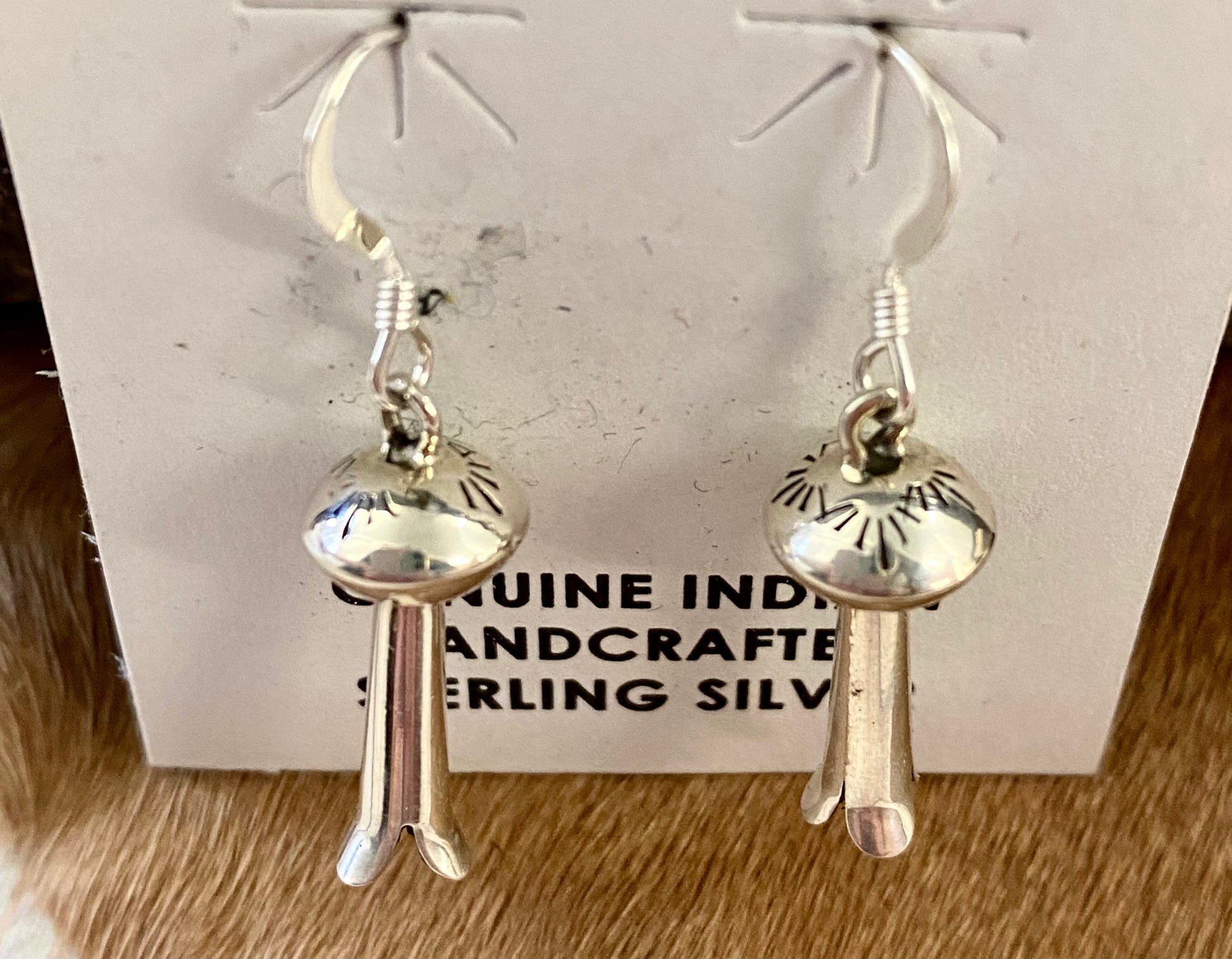 Sterling silver native made small hook blossom lightweight beautiful earrings. These simple but elegant earrings are perfect for everything from casual everyday wear to dressing up events.   Size: 1" Inch Length  Signed: Unsigned