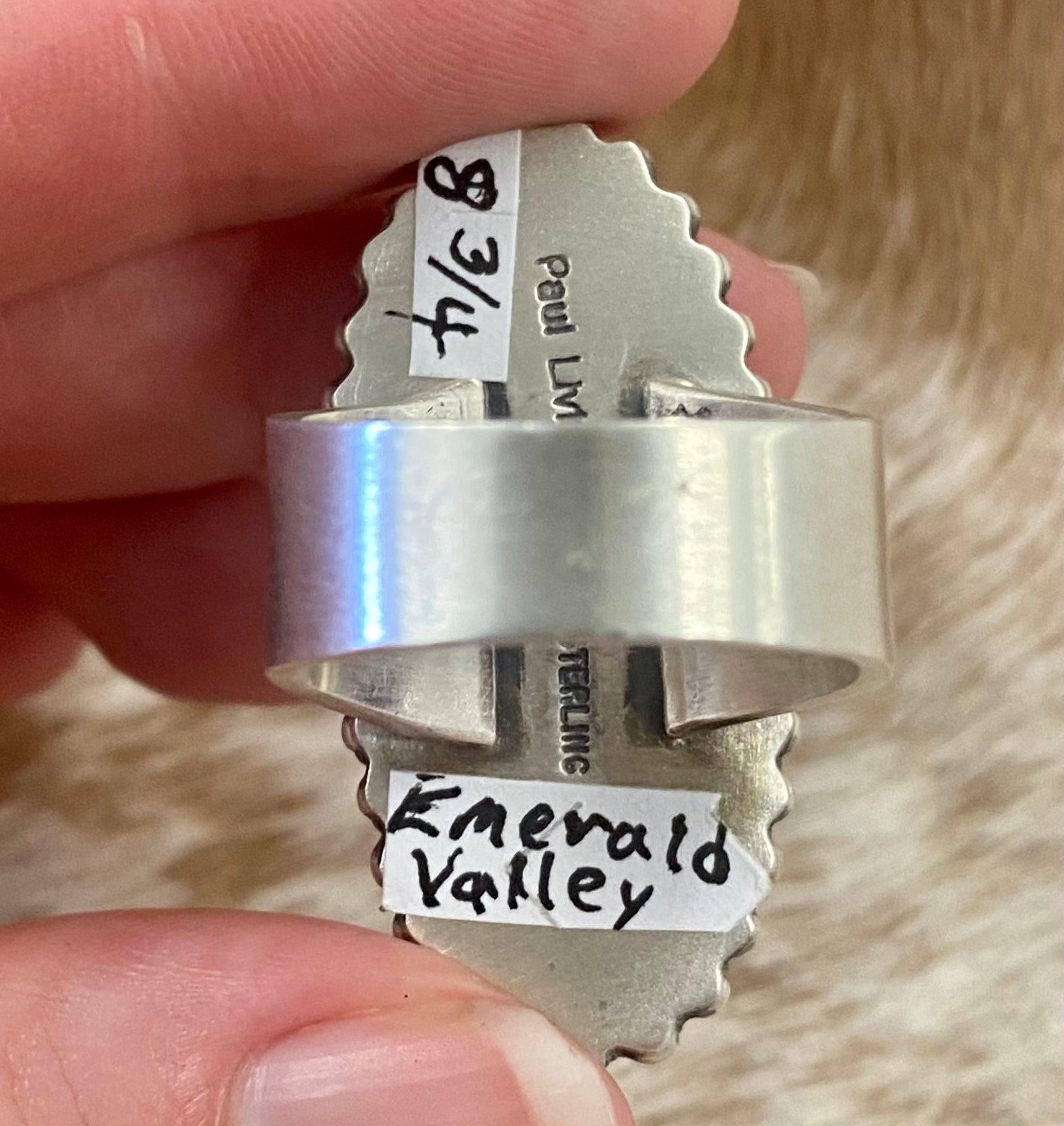 Sterling silver Emerald Valley Turquoise handmade single stone unique statement size 8 3/4 ring.  The perfect piece to add to anyone's jewelry collection! This beautiful ring is stamped sterling and signed by Native American artist Paul Livingstone on the back.    Size: Length 1 1/2” x  3/4” inch width   Ring Size: 8 3/4  Signed: YES "Paul Livingstone"  Artist/ Hallmark: Paul Livingstone  Stone: Emerald Valley Turquoise