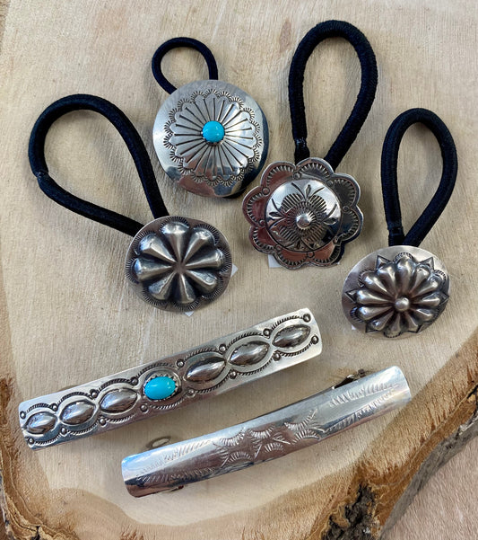 Silver concho style black hair tie. Handmade simple yet striking hair accessory to spice up any hairdo. The perfect addition to any outfit for any occasion. Add it in to your braid or ponytail. Concho hair tie - Western hair tie - Western Hair Accessories