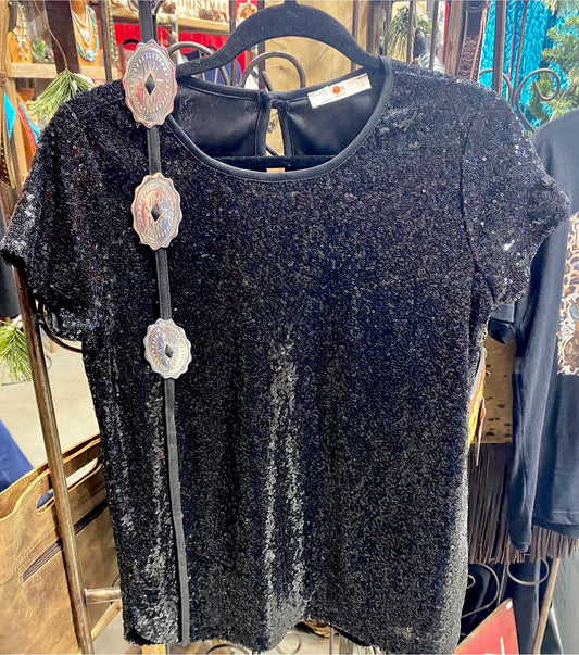 Black sequin fully lined top. This top is so sparkly and the perfect bit of glam to add in to your wardrobe. Style it alone or with a fun jacket or vest at your next night out on the town or celebration. Made in the USA! Sizing Information: Fabric: 95% Polyester 5% Spandex Runs True To Size Small - 2/4 Medium - 6/8 Large - 10/12 XL - 12/14