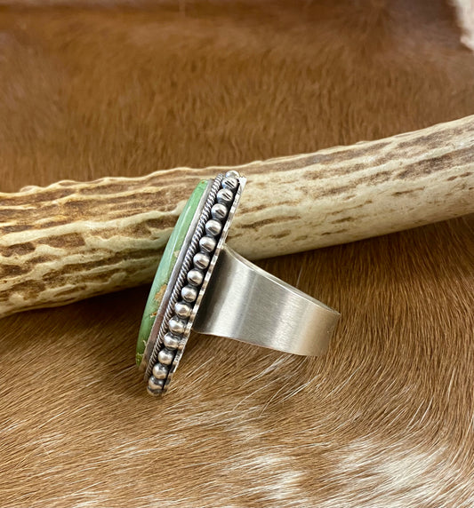 Sterling silver Emerald Valley Turquoise handmade single stone unique statement size 8 3/4 ring.  The perfect piece to add to anyone's jewelry collection! This beautiful ring is stamped sterling and signed by Native American artist Paul Livingstone on the back.    Size: Length 1 1/2” x  3/4” inch width   Ring Size: 8 3/4  Signed: YES "Paul Livingstone"  Artist/ Hallmark: Paul Livingstone  Stone: Emerald Valley Turquoise