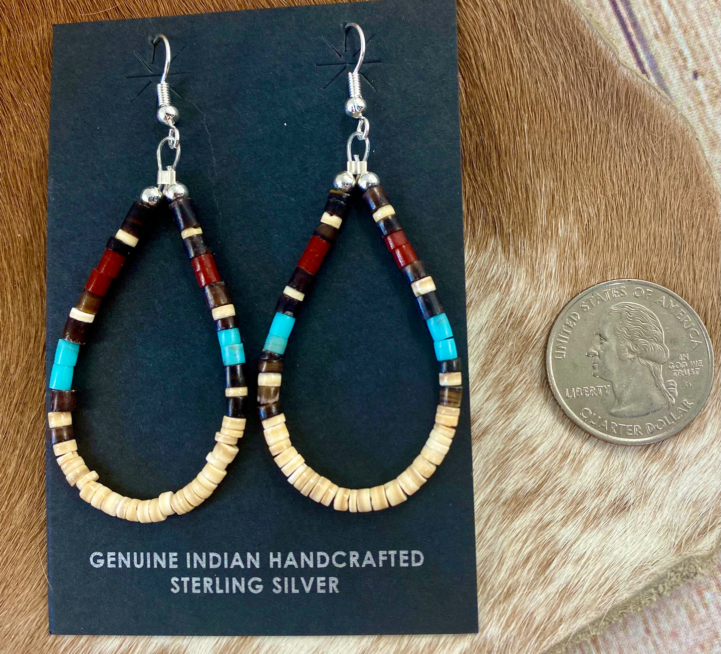 Beautiful turquoise, jet and heishi beaded teardrop sterling silver earrings. Made by talented Native American artist and silversmith Ella Mae Garcia. Size: 2” Inches length x 1” inch width