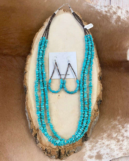 This handmade 25” inches long length necklace is an absolute beauty. A stunning three-strand turquoise beaded necklace with brown heishi beads. Layer it or wear it alone or add a pendant to keep your look totally unique. The perfect dainty layering piece! Simple, yet striking! Size: 25” Inches Length Stone: Turquoise