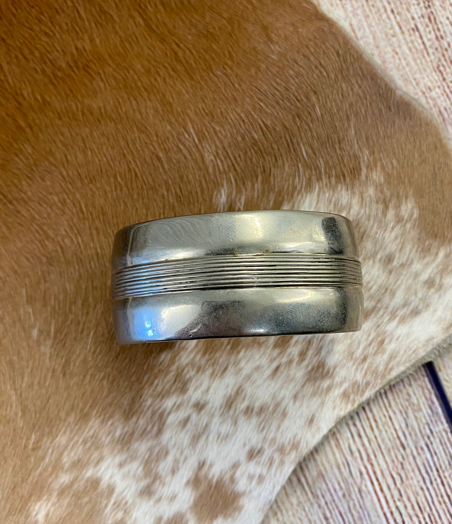 Beautiful unique simple Nickel Silver handmade cuff. Signed JY by artist inside of the cuff band. The perfect piece to add to you or your loved ones jewelry collection. Signed: YES "JY" Material: Nickel Silver Size: 5 1/2” inch length inside measurement + 1 1/4” inch gap 1” inch length width Handmade Navajo Made Nickel Silver Cuff Signed JY By Artist