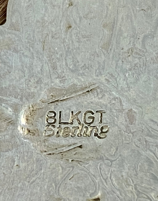 Beautiful sterling silver Native made turquoise cross pendant. Stamped sterling and signed BLKGT by Native American artist silversmith Arnold Blackgoat. The perfect cross to wear on any length chain necklace or a very small 3mm Navajo pearl necklace. Size: 2” inches length x 1.5” inches width Signed: YES "BLKGT" Hallmark/Artist: Arnold Blackgoat Stone: Turquoise