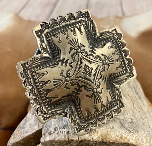 Large Silver Cuff Signed By Native Artist Silversmith Vincent J. Platero Statement Cross Silver Cuff Native American Artist Vincent J. Platero Sterling silver extremely detailed large stamped sterling and signed VJP cross shaped cuff. Authentic Native made and handcrafted cuff by Vincent J. Platero. This cuff is sure to be a show stopper in your jewelry collection.