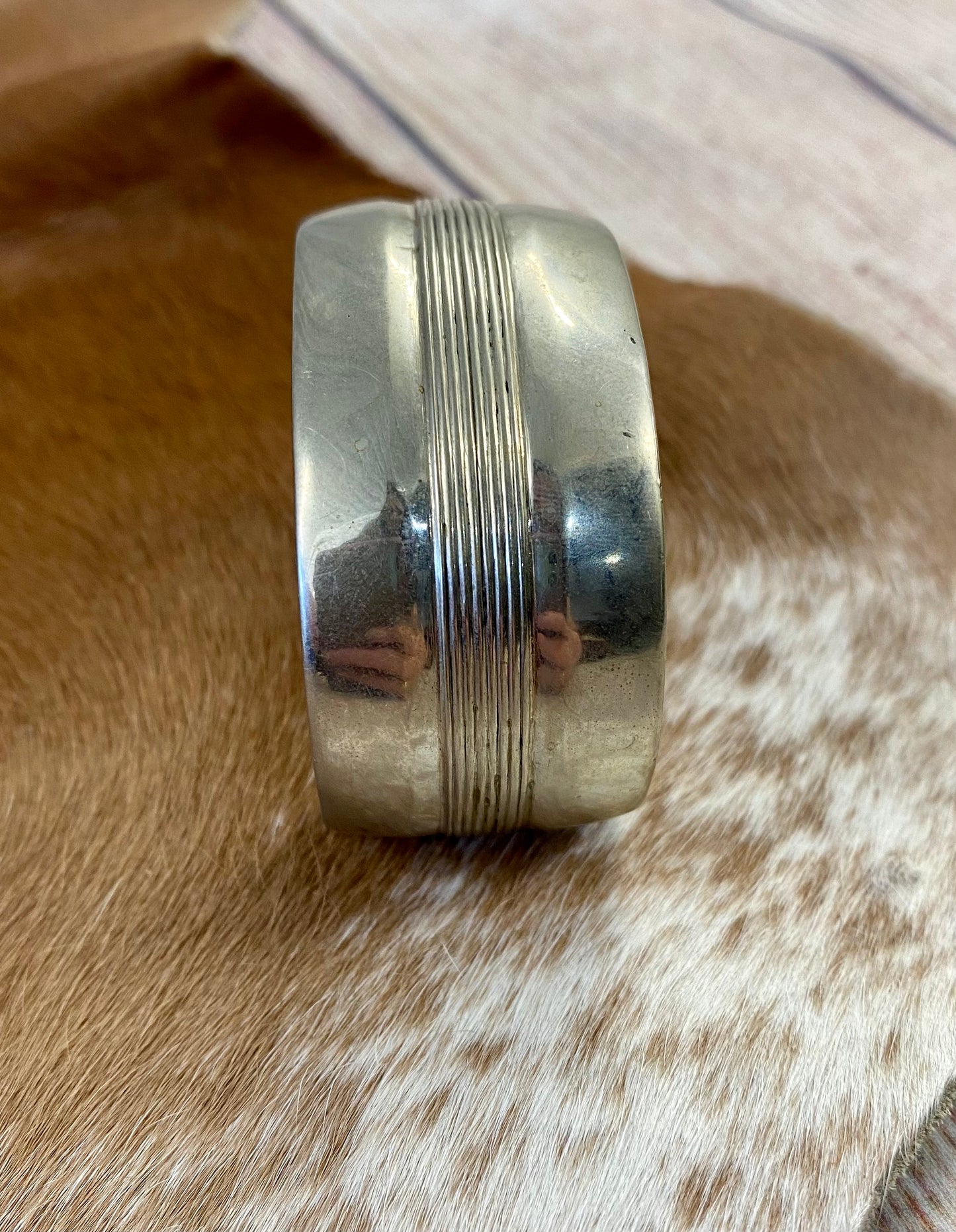 Beautiful unique simple Nickel Silver handmade cuff. Signed JY by artist inside of the cuff band. The perfect piece to add to you or your loved ones jewelry collection. Signed: YES "JY" Material: Nickel Silver Size: 5 1/2” inch length inside measurement + 1 1/4” inch gap 1” inch length width Handmade Navajo Made Nickel Silver Cuff Signed JY By Artist