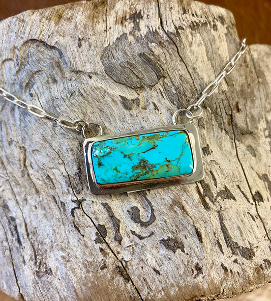 Sterling Silver Native American Made Turquoise Bar 20" Inches NecklaceSterling silver beautiful lightweight turquoise bar chain necklace. Perfect piece to wear alone or layered with other necklaces. Native American handmade by artist silversmith Lee McCray. Size: 20” inches Signed: YES Hallmark/Artist: Lee McCray Stone: Turquoise The Crockett Turquoise Bar Necklace By Lee McCray