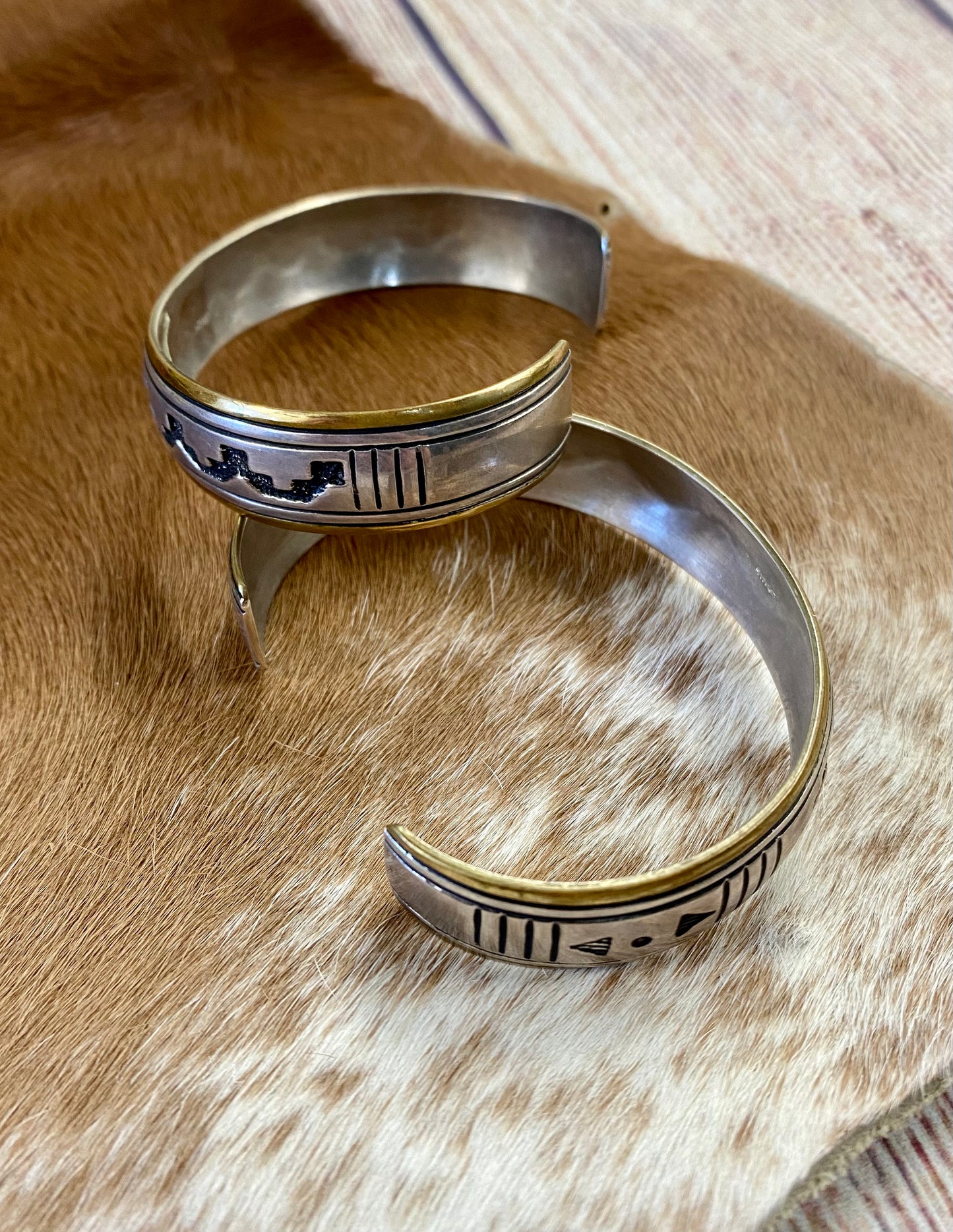 This collection of Navajo-made jewelry includes pieces of original Tommy Singer jewelry pieces. Stamped sterling and signed with Tommy Singer jewelry hallmark. Add a piece of Tommy Singer Native American jewelry to your jewelry collection today! Beautiful Tommy Singer jewelry for sale. Tommy Singer Navajo jewelry is the perfect gift!