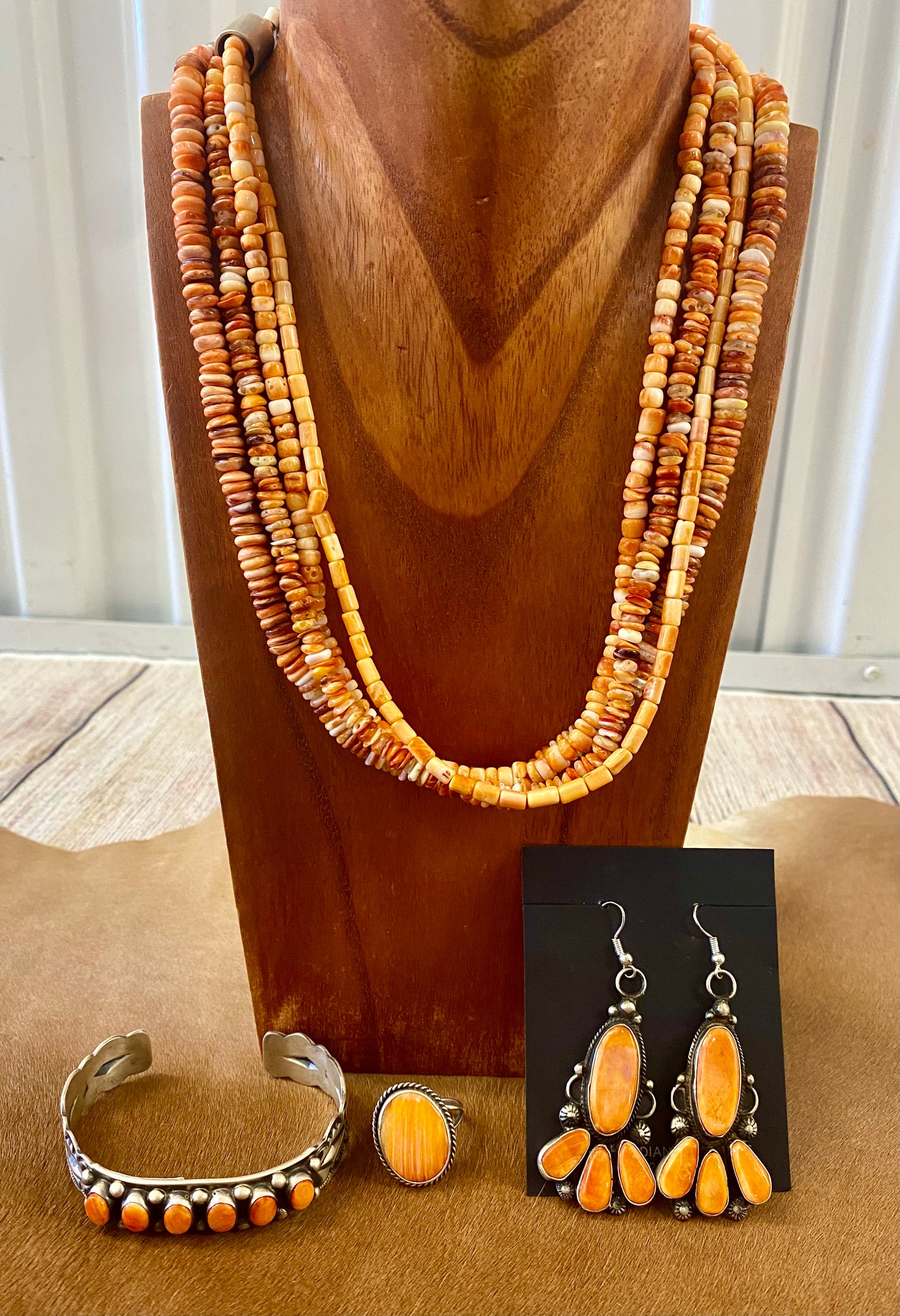 Beautiful statement spiny oyster sterling silver hook earrings. This piece is stamped sterling and signed on the back by their native artist silversmith. These will make a pop in any jewelry collection.   Size: 2" Inches length   Signed: YES  Stone: Spiny Oyster