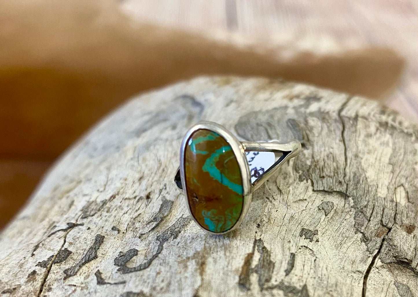 Royston turquoise single stone size 8 sterling silver ring. This beautiful and simple yet elegant ring will be a beautiful addition as a staple or statement piece in your jewelry collection. This piece is signed “K” by artist on back of the ring. Size: 1” Inch Length Signed: YES "K” Stone: Royston Turquoise