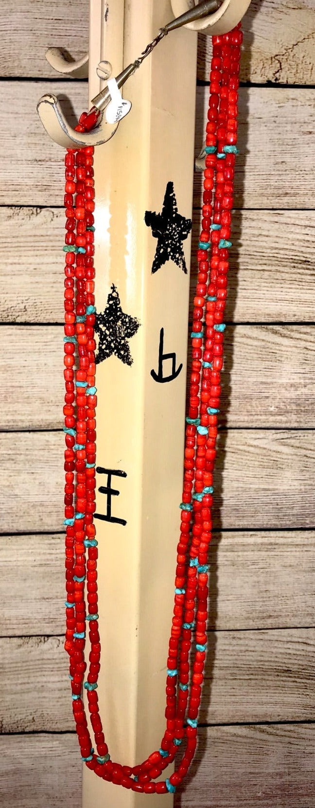 The Amanda Three Strand Coral and Turquoise 30" Inch Length NecklaceTriple strand native made coral and turquoise with sterling silver clasp necklace. This firecracker is beautiful and makes for the PERFECT summertime necklace. The perfect necklace to add a pendant to, layer with other necklaces, or wear alone! Size: 30” Inch Length Closure: Hook Stone: Turquoise and Coral Navajo Made Long 3 Strand Coral & Turquoise 30" Inch Length Necklace