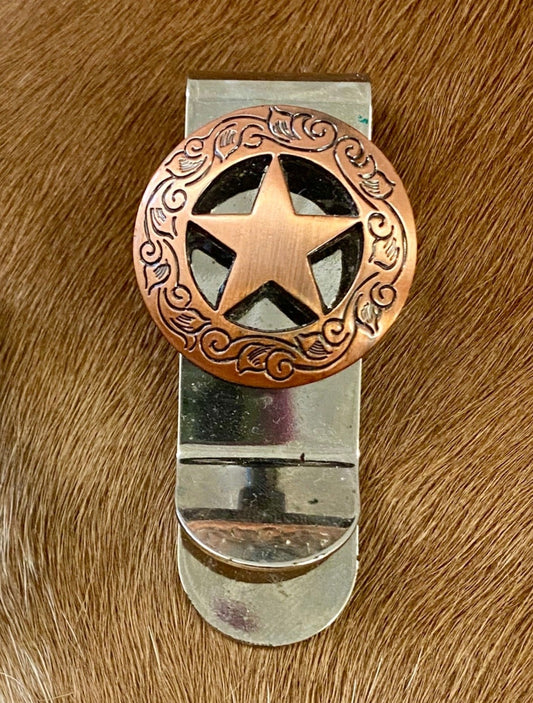 The Lone Star Money Clips - Ny Texas Style Boutique Western and cowboy themed star bronze color money clip. The perfect gift for the cowboy and rancher in your life. Western apparel and accessory boutique located in Katy, Texas.