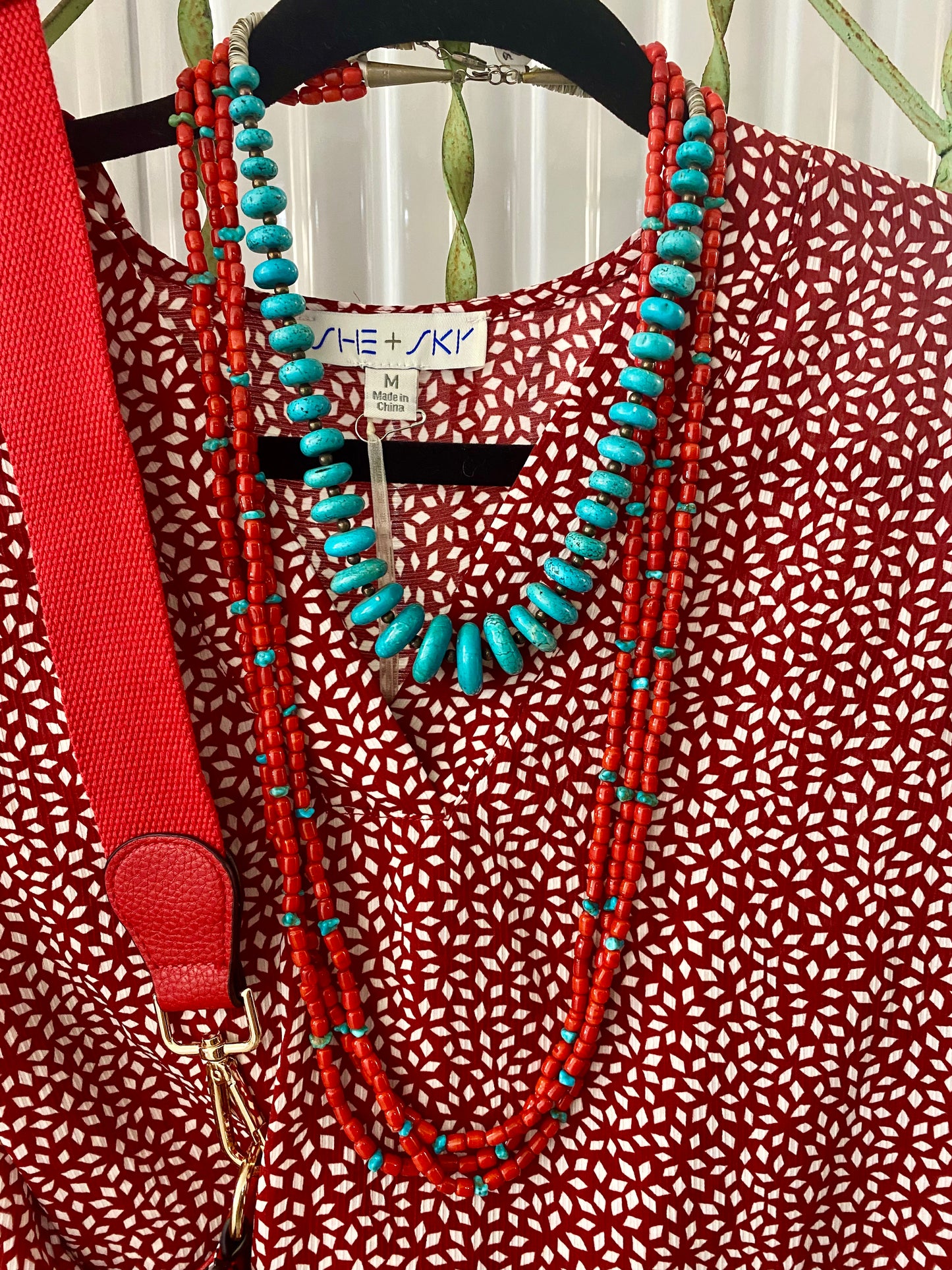 The Amanda Three Strand Coral and Turquoise 30" Inch Length NecklaceTriple strand native made coral and turquoise with sterling silver clasp necklace. This firecracker is beautiful and makes for the PERFECT summertime necklace. The perfect necklace to add a pendant to, layer with other necklaces, or wear alone! Size: 30” Inch Length Closure: Hook Stone: Turquoise and Coral