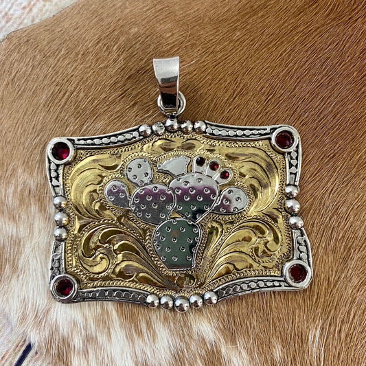 The Large Cactus Pendant - Ny Texas Style Boutique Large Engraved Western Silver Plate Cactus Pendant With Red Stones Handmade large rectangle shape cactus pendant featuring silver plate with gold plate engraving on front. Includes 7 red stones. 2 ½ inches by 1 7/8 inches. The perfect western cactus pendant to add to a chain or Navajo pearl necklace. Cactus Western Silver Pendant, Cactus Pendant Gold, Unique Western Jewelry Pendants