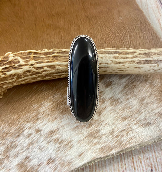 Large sterling silver onyx single stone Native made statement size 7 1/2 ring. Stamped sterling and signed V. Eriacho by Native American artist silversmith V. Eriacho. The perfect piece to add to anyone's jewelry collection.! Size: 2” inches length x 3/4” inch width Ring Size: 7 1/2 Signed: YES "V. Eriacho " Hallmark/Artist: V. Eriacho Stone: Onyx