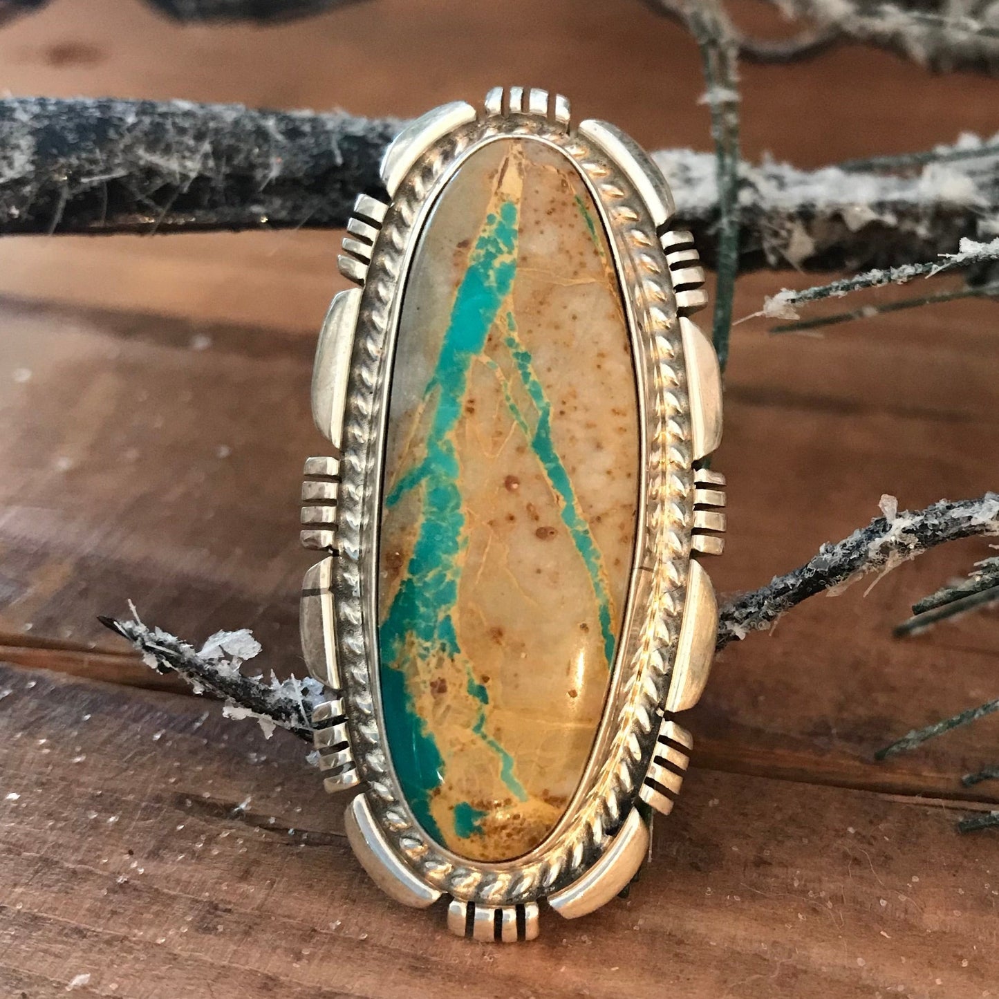 The Boulder Turquoise Ring (Size 9.5) - Ny Texas Style Boutique Boulder turquoise beautiful sterling silver long ring. Stamped sterling, signed NJ by Native American artist and silversmith inside the ring band. The perfect size 9.5 ring for your index, middle, or ring finger! Size 9.5 Length: 1.5" Inch Signed: YES "NJ" Stone: Boulder Turquoise Sterling Silver Boulder Native American Made Turquoise Size 9.5 Ring