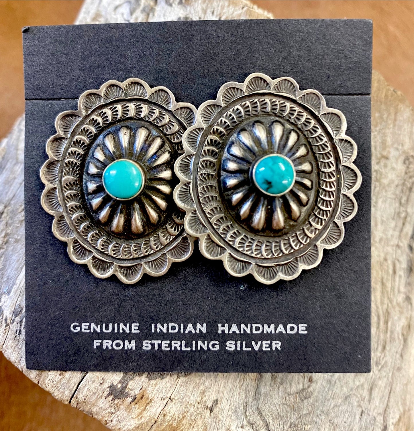 Native American Made Sterling Silver Concho Earrings With Turquoise Authentic large post concho style sterling silver earrings with turquoise. Stamped sterling and signed by Native American artist silversmith on the back inside the indent of the earrings.