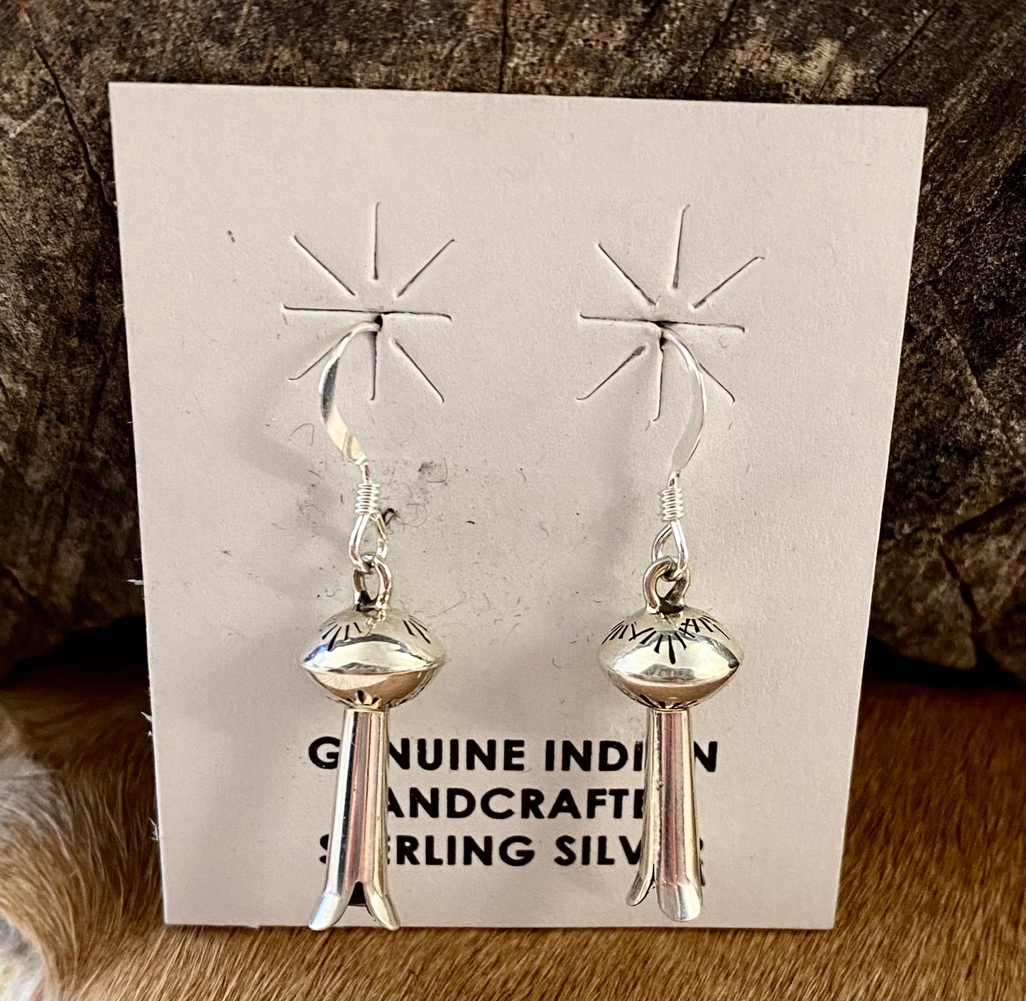 Sterling silver native made small hook blossom lightweight beautiful earrings. These simple but elegant earrings are perfect for everything from casual everyday wear to dressing up events.   Size: 1" Inch Length  Signed: Unsigned