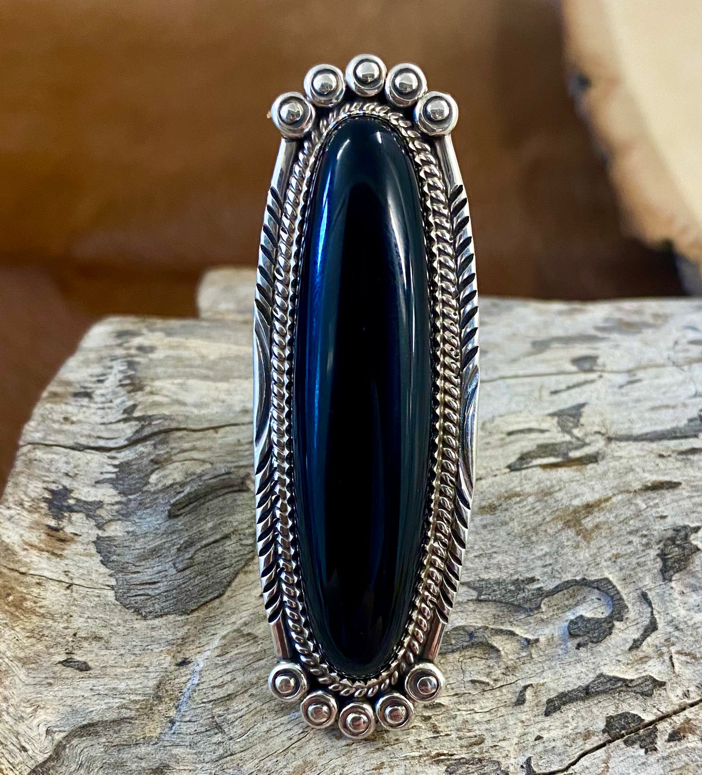 Large sterling silver onyx single stone Native made statement size 8 ring. Stamped sterling and signed PY by Native American artist silversmith Phillip Yazzie. The perfect piece to add to anyone's jewelry collection. Size: 2.5” inches length x 1” inch width Ring Size: 8 Signed: YES "PY" Hallmark/Artist: Phillip Yazzie Stone: Onyx