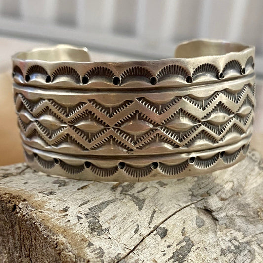 Silver Very Detailed Unique Cuff Made By Native Artist Freddie Maloney Sterling silver very detailed all silver authentic Native made cuff by Native American artist silversmith Freddie Maloney. The perfect piece to wear daily or for a special occasion. Dress this stunning cuff up or down depending on what style you are going for. Stamped sterling and signed Maloney inside of the cuff.