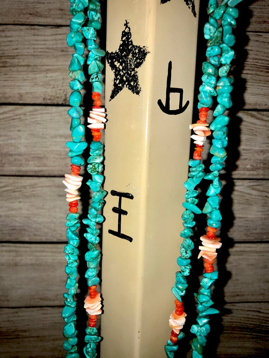 Native American Made 2 Strand Turquoise, Coral, Spiny Oyster Necklace This handmade necklace is a absolute beauty. A stunning Native made two-strand turquoise, coral, and spiny oyster necklace. Layer it or wear it alone or add a pendant to keep your look totally unique. The perfect dainty layering piece! Simple, yet striking! Size: 29" Inches Length Stone: Turquoise, Coral. and Spiny Oyster