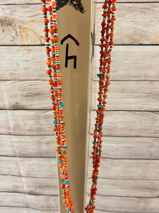 The Ouray Necklace - Ny Texas Style Boutique Stunning and authentic triple strand sterling silver necklace featuring Coral, turquoise, and heishe. This Native American made necklace is long but you can make it longer if desired by adding a beautiful pendant to it or you can wear it layered with another necklace. The options for the necklace and outfits are endless! Adds the perfect pop of color to your jewelry collection. Size: Length: 32” Inches