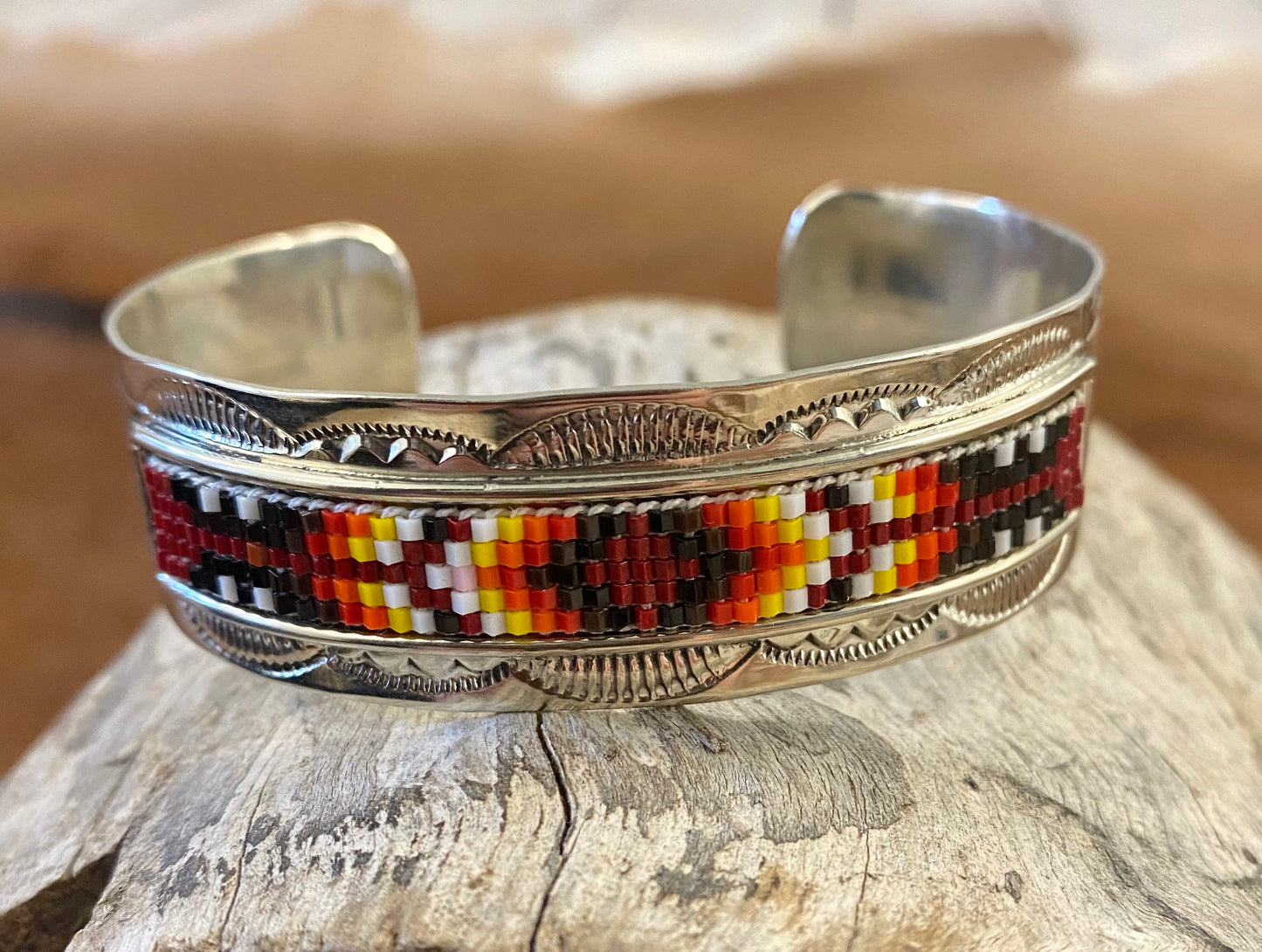 The Turnpike Aztec Beaded Cuff Beautiful unique stamped Nickle sliver and signed by Native American artist silversmith inside of the cuff band. Aztec seed beaded bright colorful Nickle silver cuff bracelet.   Size: 5” inches inside measurement - gap 1-1.5” inches