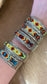 The Turnpike Aztec Beaded Cuff Beautiful unique stamped Nickle sliver and signed by Native American artist silversmith inside of the cuff band. Aztec seed beaded bright colorful Nickle silver cuff bracelet.   Size: 5” inches inside measurement - gap 1-1.5” inches 