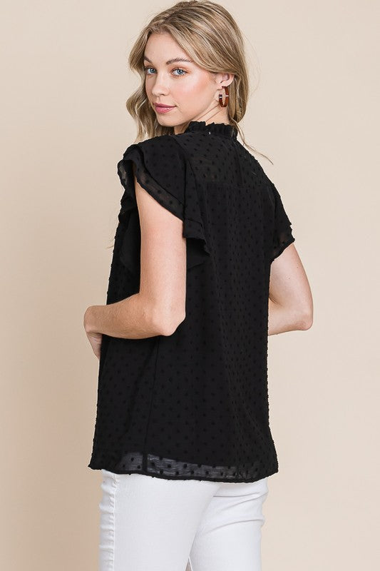 Black High Neck Short Sleeve Blouse | Western Business Casual Outfit Woven pom pom style short frill sleeved blouse with high neck. This blouse is so so cute and unique. It can be worn and styled so many different ways. From work professional with a blazer to casual tucked in to a pair of bell bottomed jeans. Perfect for NFR, business casual, and date night outfits. 