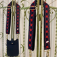 Change the look of any purse with this navy and red purse strap! These stylish guitar style strap adds a pop of color and fashion to any bag, big or small. Adjustable down to 29 inches for a belt bag, or 52 inches at its longest length for a crossbody strap. The newest trend in handbags, at a fraction of the designer price!