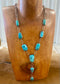 Stunning Morenci turquoise lariat style sterling silver Native American-made statement 31" inches length necklace. The perfect necklace to gift to your loved one or keep for your own jewelry collection! This piece is stamped sterling and signed "K" by the talented Native artist Karlene Goodluck.   Size: 31” inches in length   Stone: Morenci Turquoise  Signed: YES "K"  Artist / Hallmark: Karlene Goodluck