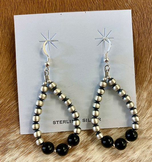 Stunning lightweight teardrop shape hook simple yet elegant sterling silver Navajo Pearl earrings with onyx. These Navajo pearl style teardrop earrings are hand strung together. Each of the sterling components are soldered closed to ensure durability and peace of mind.  Size: 2” inches length x 1” inch width   Stone: Onyx 