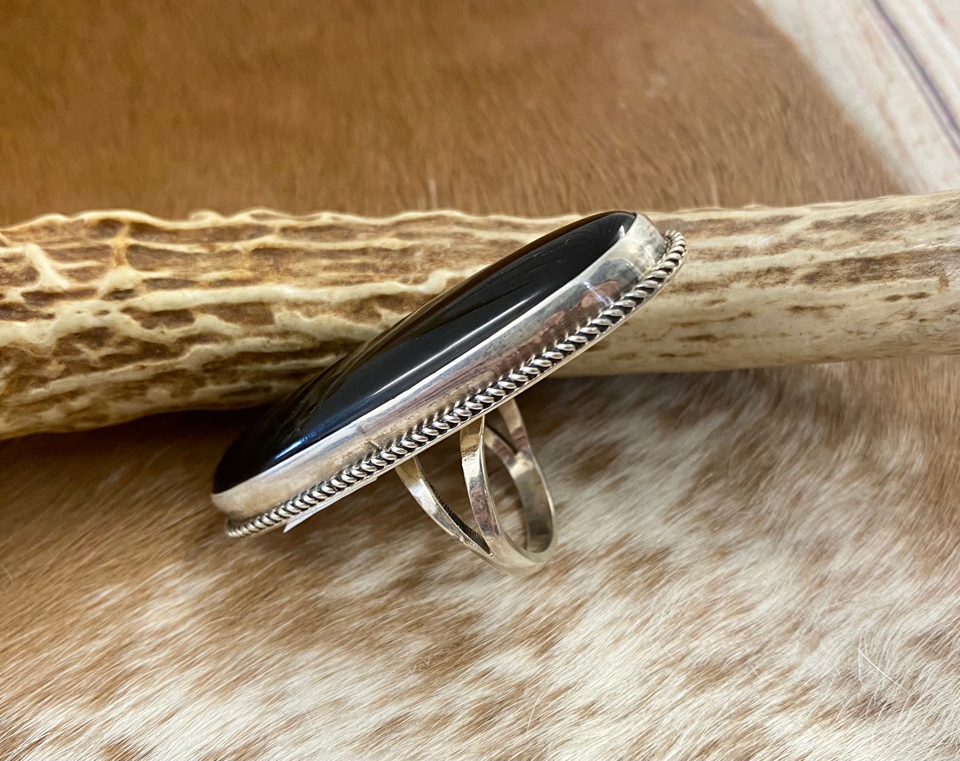 Large sterling silver onyx single stone Native made statement size 7 1/2 ring. Stamped sterling and signed V. Eriacho by Native American artist silversmith V. Eriacho. The perfect piece to add to anyone's jewelry collection.!   Size: 2” inches length x 3/4” inch width   Ring Size: 7 1/2   Signed: YES "V. Eriacho "  Hallmark/Artist: V. Eriacho   Stone: Onyx